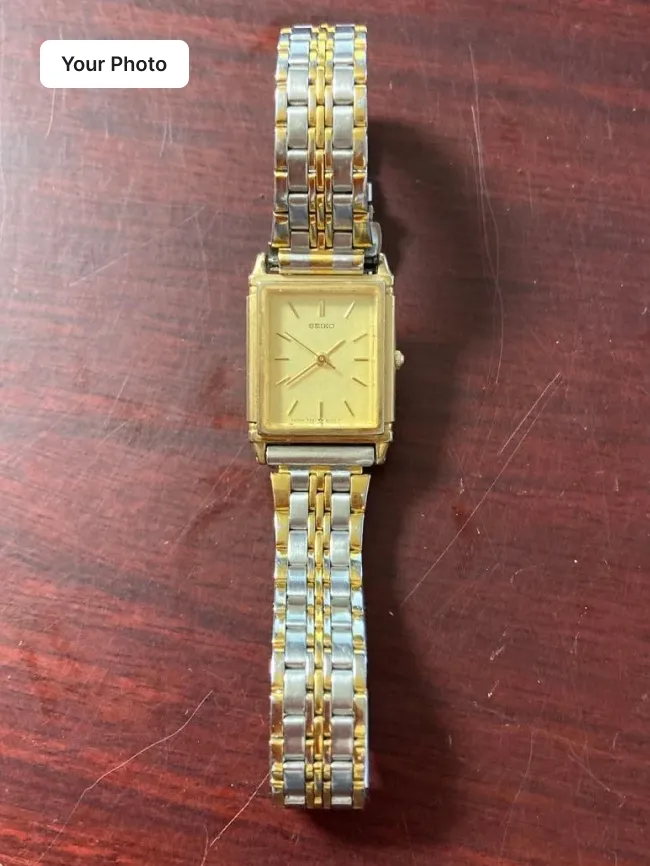 Luxury watch wrist campaign shot — original photo (before)